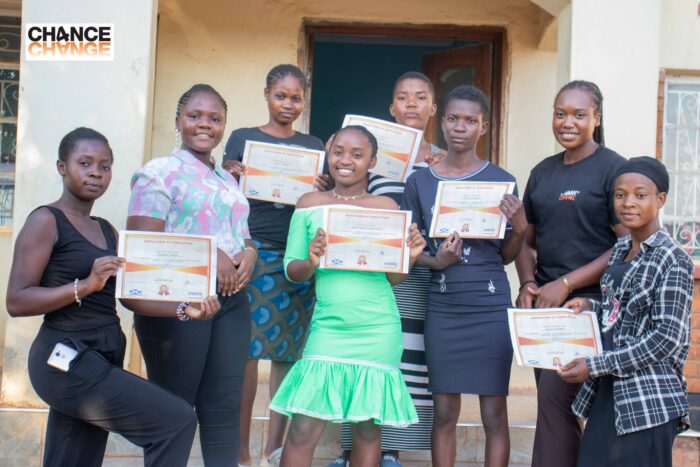 Eight adolescent girls in Lilongwe completed Mwayi Wosintha's Pioneers of Change entrepreneurship course, gaining business skills, challenging gender barriers, and launching their own maize flour enterprise with startup support.